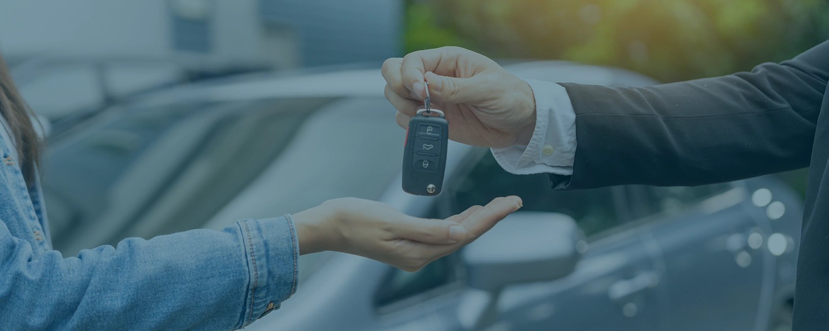 image of handing over the keys to a car